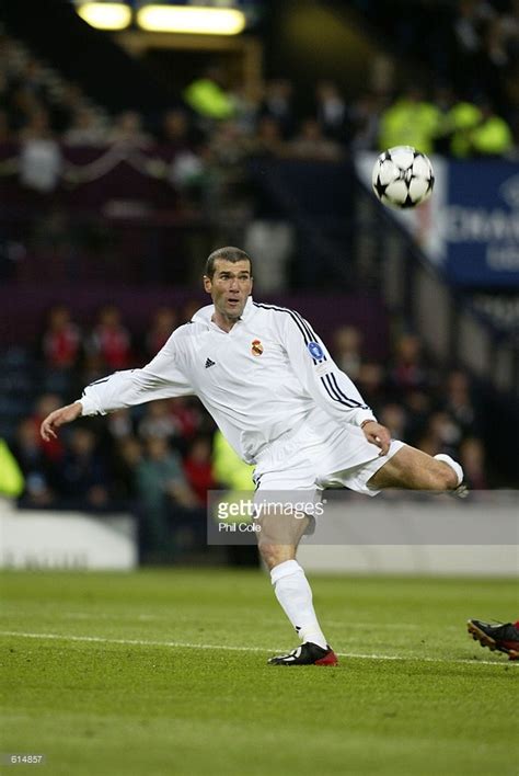 Zinedine Zidane of Real Madrid keeps his eye on the ball as he scores a wonderful goal during ...