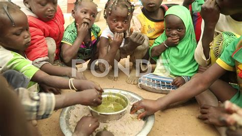 Happy African Kids Eating