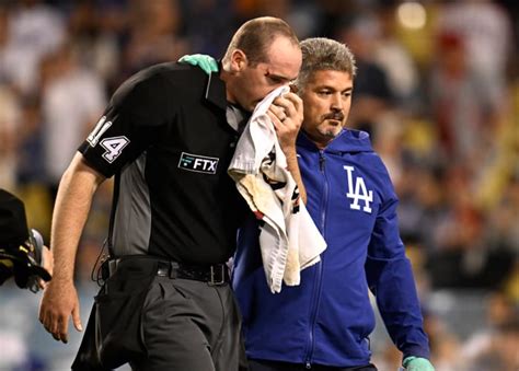 Umpire Hospitalized After Taking Broken Bat To Face: Fans React - The Spun