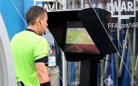 The Video Assistant Referee system, known as VAR, is football's first use of video technology to ...