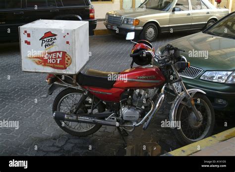 Pizza Hut Delivery Motorcycle Stock Photo - Alamy