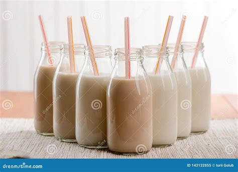 Bottles of Milk with Straws Stock Image - Image of drink, almond: 143132855