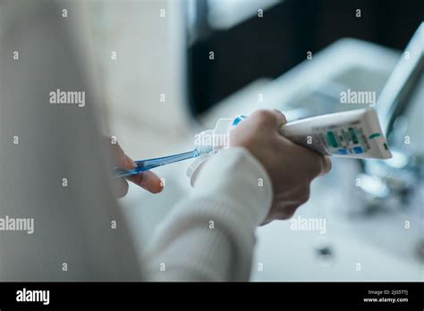 Japanese man brushing teeth Stock Photo - Alamy