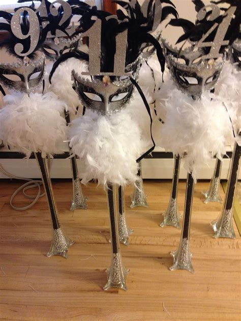 Masquerade center pieces | Masquerade party centerpieces, Sweet 16 masquerade party, Masquerade ...