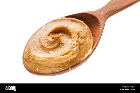 Spoon of peanut butter Stock Photo - Alamy