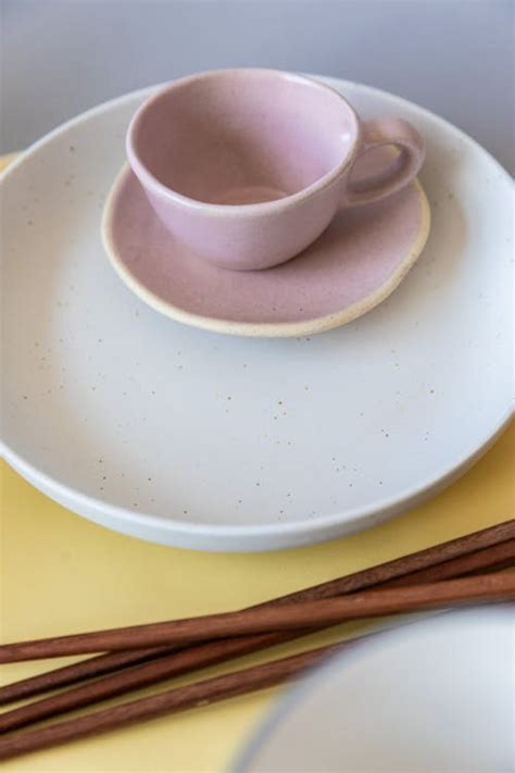 Pink Ceramic Teacup on White Ceramic Plate · Free Stock Photo