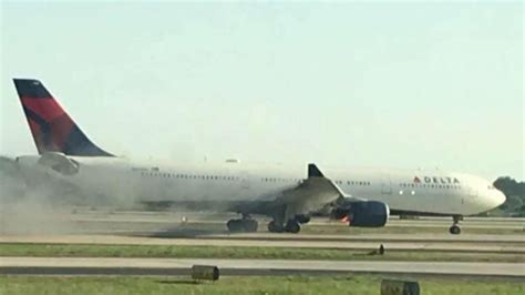 Delta Flight Makes Emergency Landing After Smoke Pours From Engine 1 ...