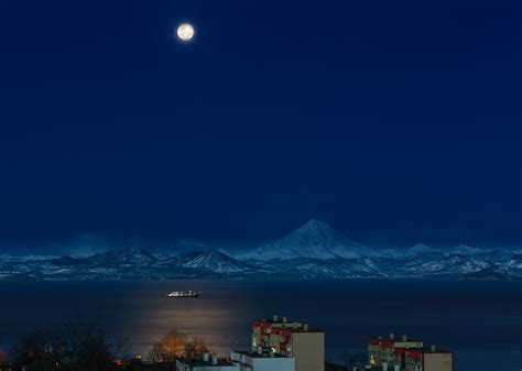 Snow Covered Mountains Under Night Sky · Free Stock Photo