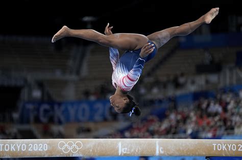 Simone Biles takes home a bronze in balance beam in Olympic return ...