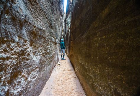 The Joint Trail looks like a slot canyon, but it is actually a narrow path between two enormous ...