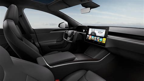 Tesla unveils new Model S with new interior, crazy steering wheel, and ...