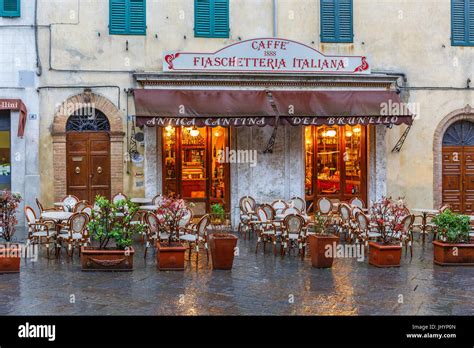 Italian Street Cafe is empty when it rains Stock Photo - Alamy