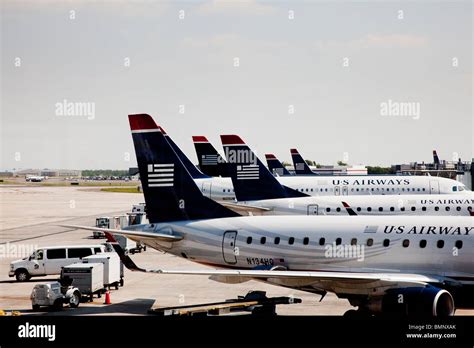 america flight branded fins US airways logo tail Stock Photo - Alamy