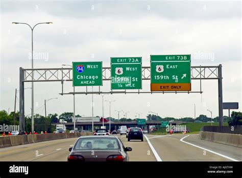 Overhead Traffic route signs on the expressway heading towards downtown ...