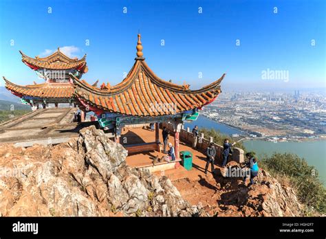 Kunming, China - January 9, 2017: Tourists enjoying the view of Kunming ...