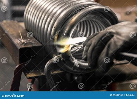 Braze welding process. stock photo. Image of work, tool - 85037186