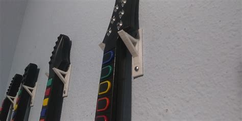 These wall mounts for my guitar hero controllers : r/functionalprint