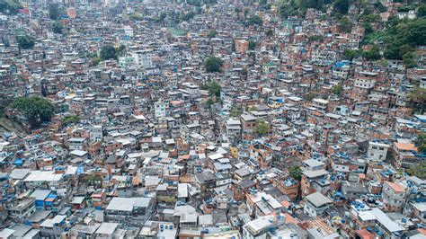 Aerial view of Favela da Rocinha, Biggest Slum in Brazil on the Mountain in Rio de Janeiro, and ...