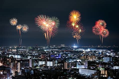 Premium Photo | Fireworks over tokyo cityscape at night, japan