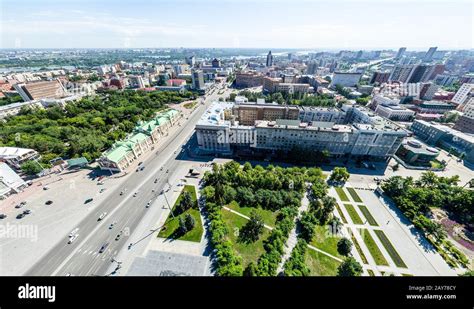 Aerial city view with roads, houses and buildings Stock Photo - Alamy