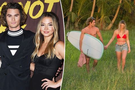 Chase Stokes and Madelyn Cline hold hands while filming ‘Outer Banks’