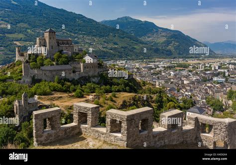 SION, SWITZERLAND - Ramparts of Tourbillon Castle, foreground, and at Stock Photo: 157650588 - Alamy