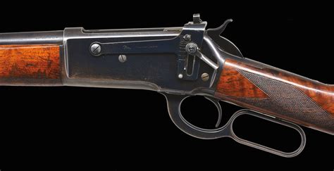 WINCHESTER MODEL 1886 LIGHTWEIGHT DELUXE LEVER ACTION RIFLE | Poulin's Antiques and Auctions, Inc.