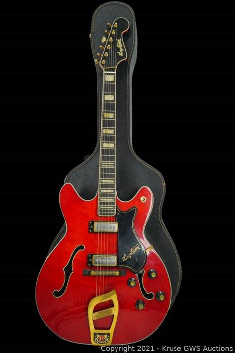 1968 cherry red guitar owned and played by Elvis Presley going up for auction | WLNS 6 News