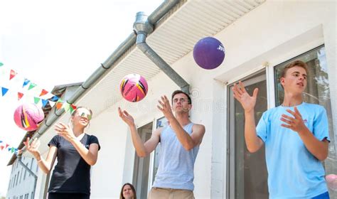 Teenagers, Simultaneously Throwing the Ball in a Circle in a Sports ...