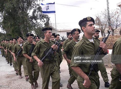 Israel-allied South Lebanon Army militiamen march pass an Israeli ...