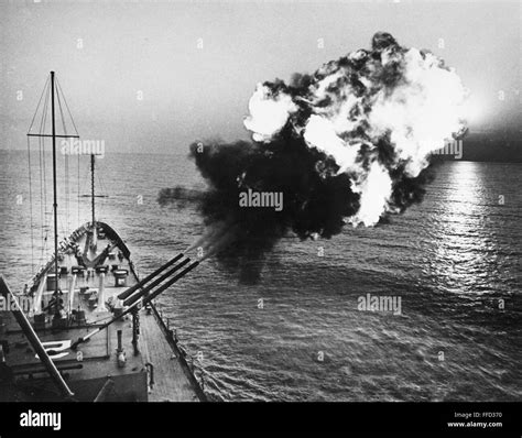 VIETNAM WAR: U.S. NAVY. /nThe cruiser U.S.S. Canberra fires a salvo against North Vietnam from ...