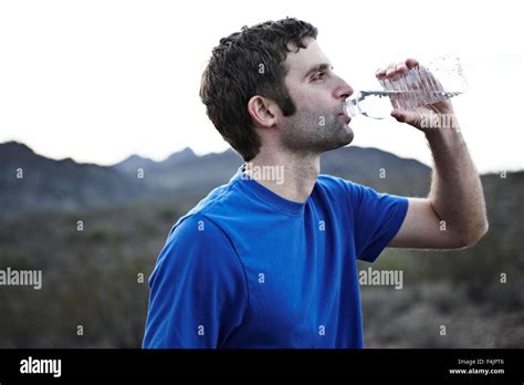 Man drinking water Stock Photo - Alamy