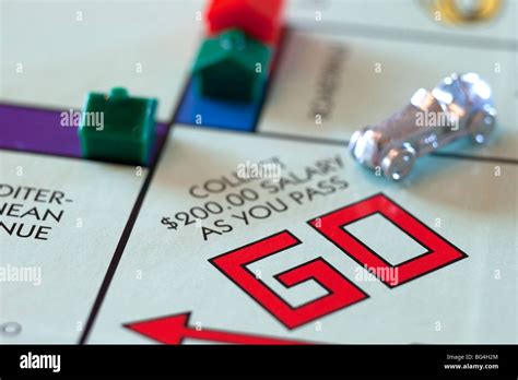 Monopoly game pieces Stock Photo - Alamy