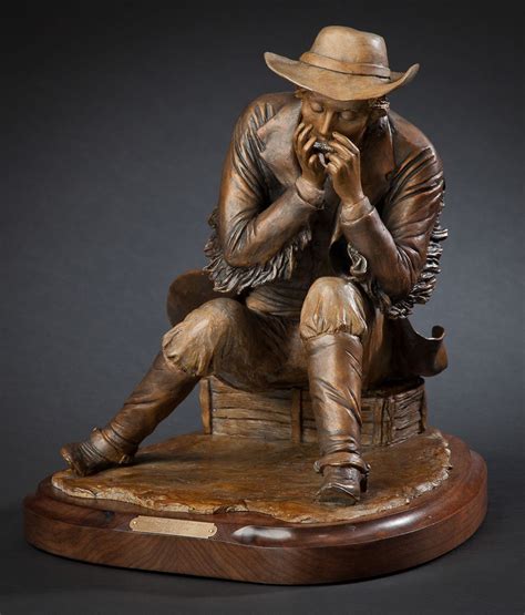 "Playing a Tune" - Limited edition bronze sculpture of a cowboy playing ...