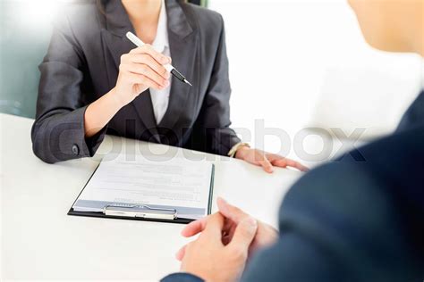 Female Manager conducting a job interview with female applicant looking ...