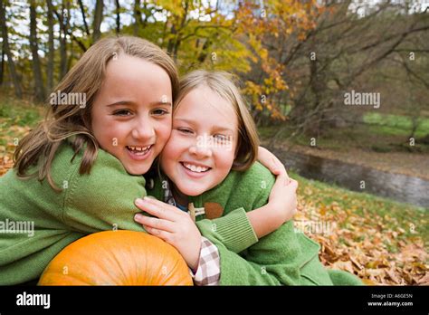 Friends hugging Stock Photo - Alamy