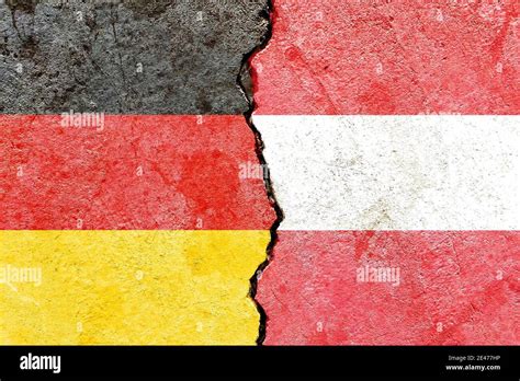 Germany VS Austria national flags on cracked concrete wall - political ...