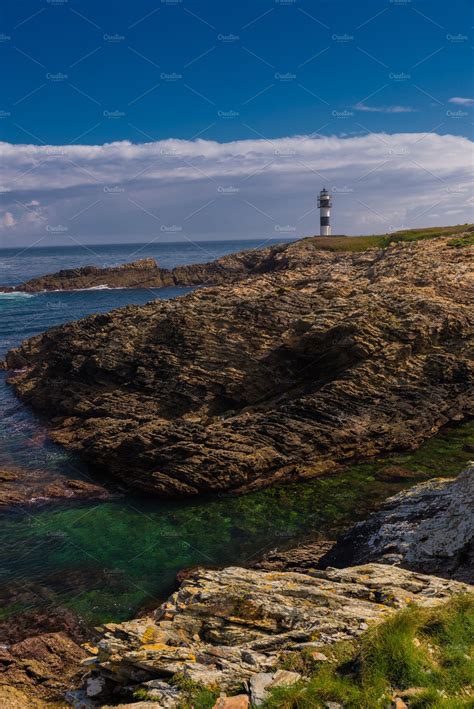 Illa Pancha lighthouse | High-Quality Nature Stock Photos ~ Creative Market