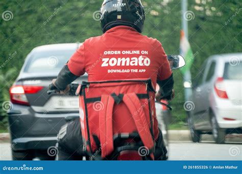 Zomato Bike Rider Delivery Boy Looking At Rider From Swiggy Food Tech Starup Apps Showing ...