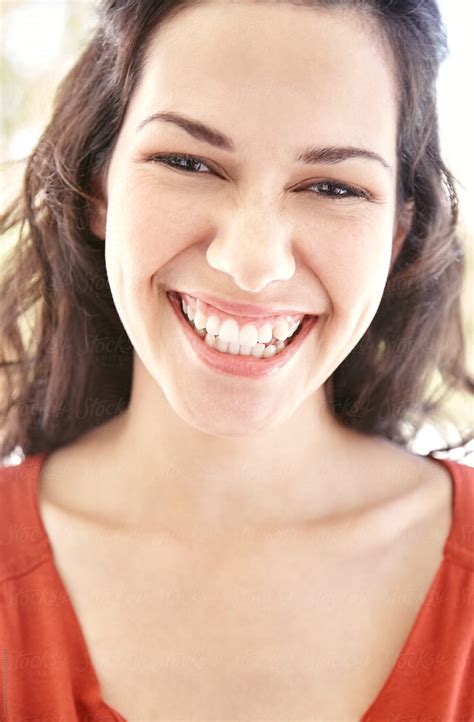 "Close Up Portrait Of Beautiful Woman Laughing" by Stocksy Contributor "Trinette Reed" - Stocksy