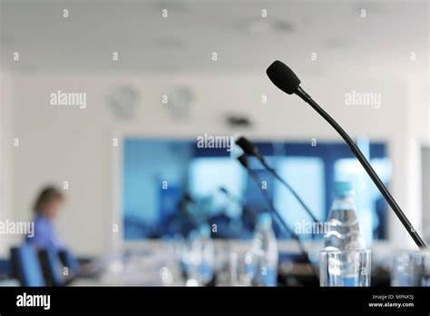 Microphone in a conference room Stock Photo - Alamy