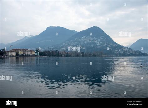 Lugano with lake and mountains Stock Photo - Alamy