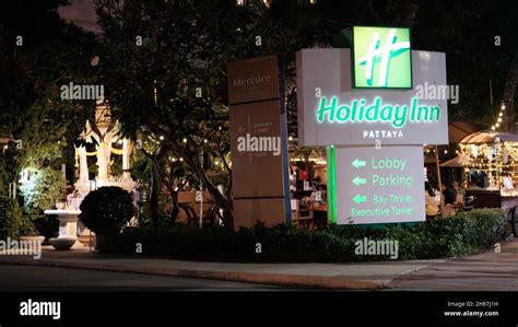 Beach Road Entrance To Holiday Inn Pattaya at night Stock Photo - Alamy