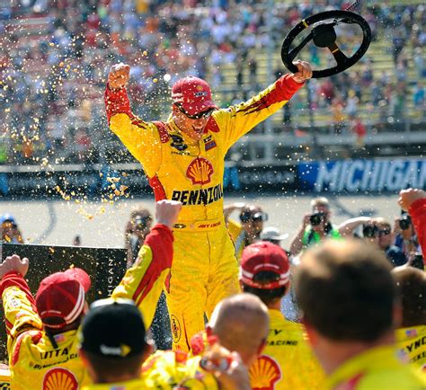 Logano wins at Michigan