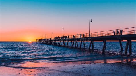 Glenelg Beach Beach Foreshore With Pier And People At Sunset Stock Image - Image of destination ...