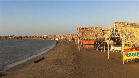 A local beach with typical kioskos on the beach , this is the way local ...