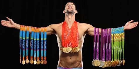 Michael Phelps Poses With All His Gold Medals