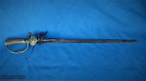 FLINTLOCK PISTOL ON SHORT SWORD 18TH CENTURY ORIGINAL