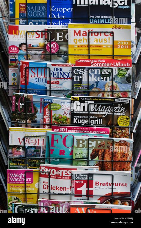 German magazines for sale on a magazine rack Stock Photo - Alamy