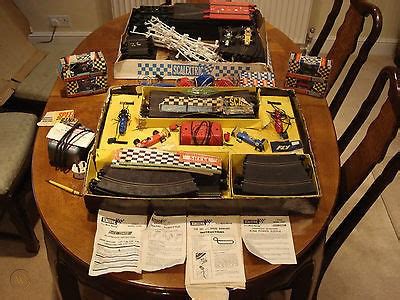 Two Vintage 1960's Scalextric Sets. Sets 70 & 12E Speed Banking + Extra 4 cars | #532756446